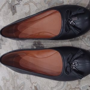 Brand new without box women's black leather Coach flat shoes size 9.5